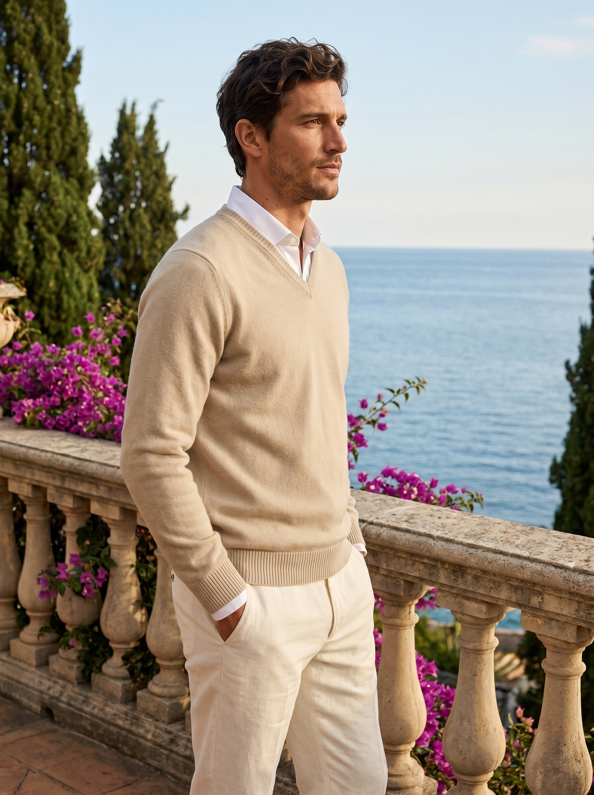 Side profile of a man wearing a beige wool V-neck jumper by Lake Como — Belvoirne