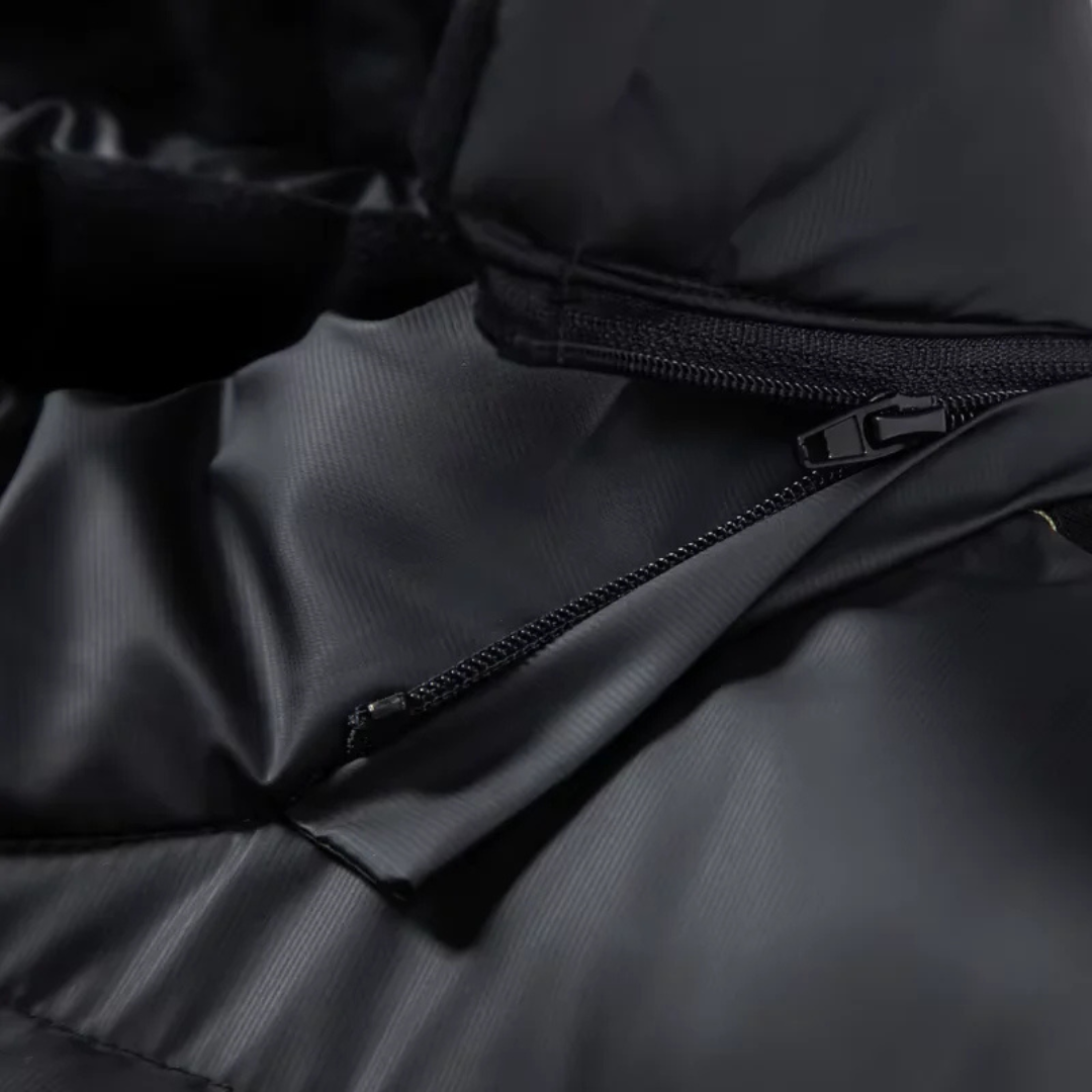 Hooded puffer jacket detail, old money men's outerwear product photo — Belvoirne