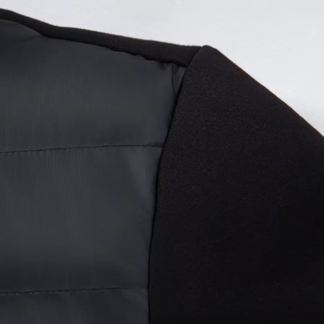 Hooded puffer jacket detail, old money men's outerwear product photo — Belvoirne