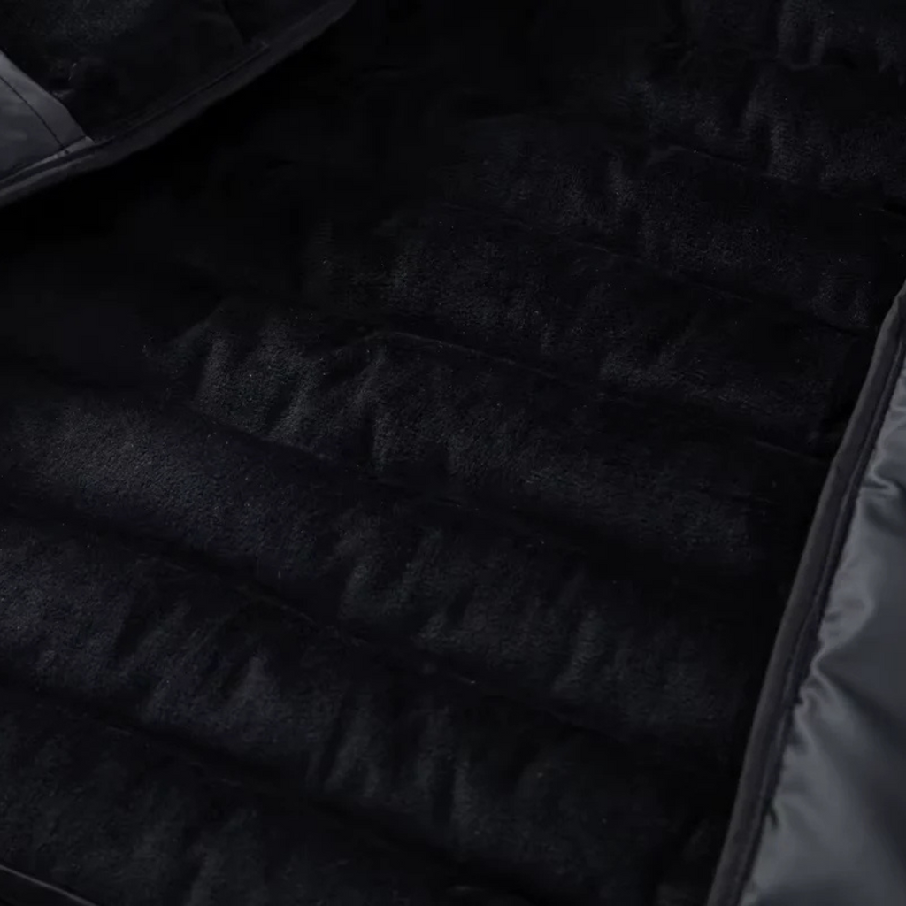 Hooded puffer jacket detail, old money men's outerwear product photo — Belvoirne