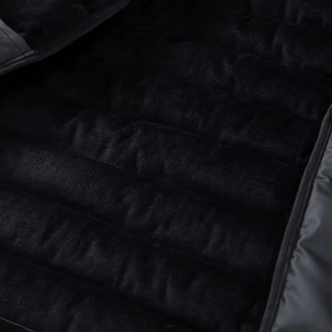 Hooded puffer jacket detail, old money men's outerwear product photo — Belvoirne