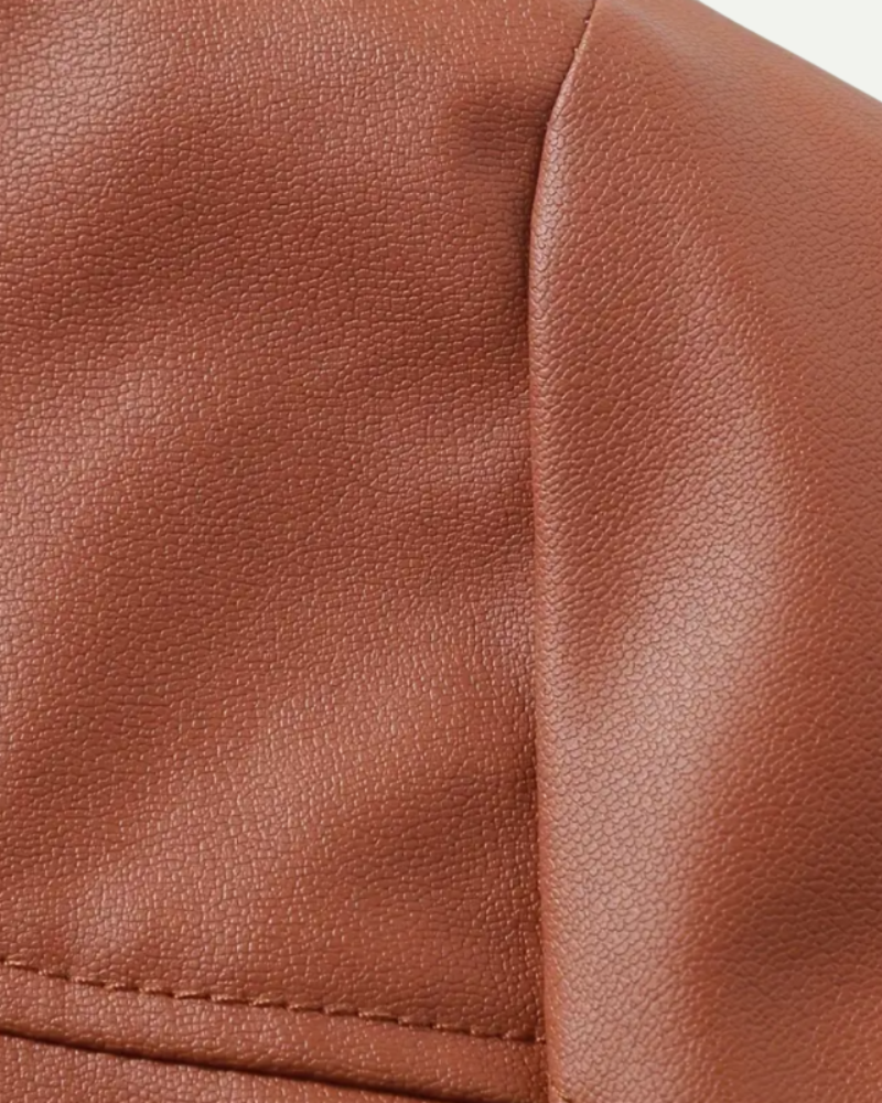 Leather biker jacket detail, old money men's outerwear product photo — Belvoirne