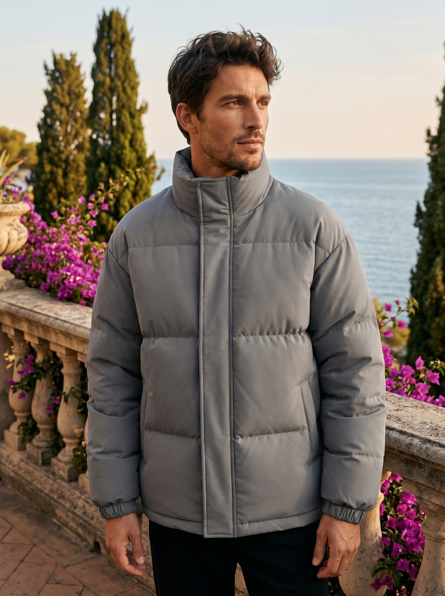 Man wearing a puffer jacket on a Lake Como terrace, old money style — Belvoirne